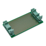Bottom of 2 inch by 3 inch perfboard with DIN clips