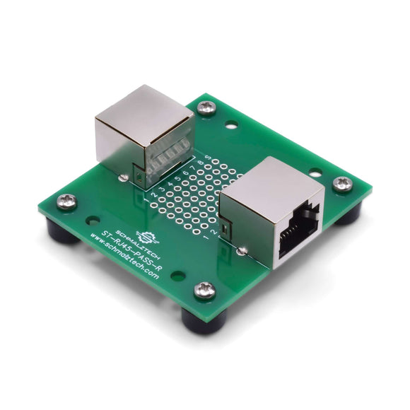 Front of RJ45 pass-through breakout board with rubber feet