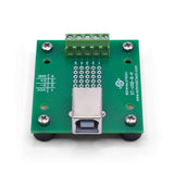 Front of USB type B breakout board with rubber feet